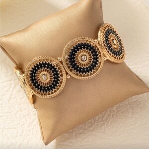 Chic Gold and Black Sunburst Bracelet